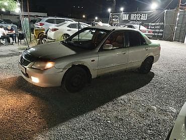 мотор 323: Mazda 323: 2001 г., Седан — 2