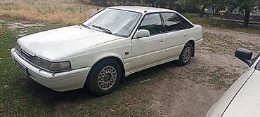 Унаа: Mazda 626: 1990 г., 2 л, Кол менен иштөөчү, Бензин, Седан — 1