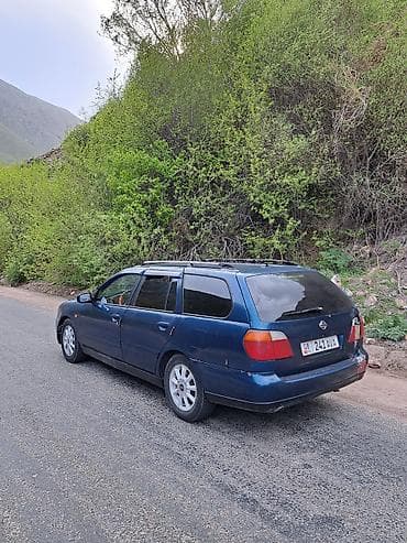 e star: Nissan Primera: 2000 г., 1.8 л, Механика, Бензин, Универсал — 7