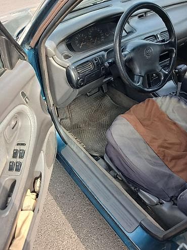 мереке авто слив: Mazda Cronos: 1993 г., 2 л, Автомат, Бензин, Седан — 8