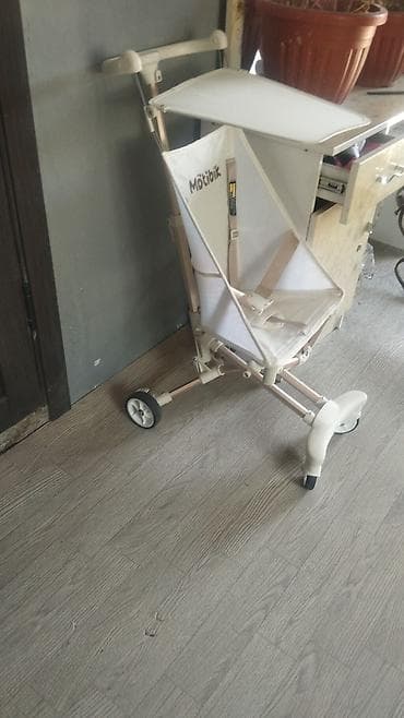 Детская прогулочная коляска-трость Motibik - Лёгкая складная