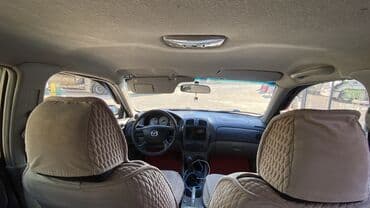 Продажа авто: Mazda : 2002 г., 1.6 л, Механика, Бензин, Хэтчбэк — 7