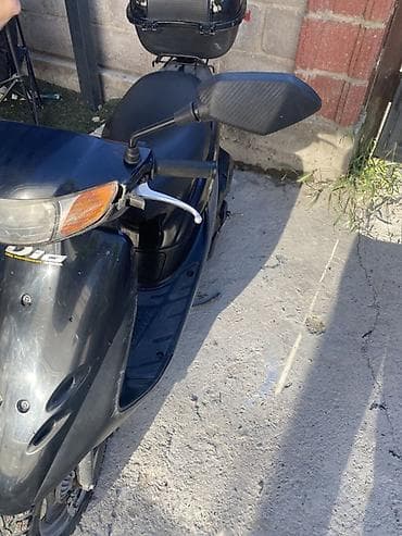 сукутер утка: Скутер Honda Dio (двухтактный) — черный - Компактный городской скутер — 1