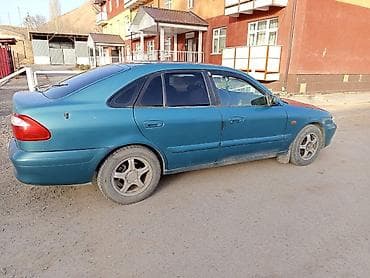 audi б 4: Mazda 626: 2000 г., Бензин, Седан — 6