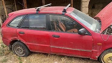 суппорт тормозной: Mazda 323: 2003 г., 1.6 л, Механика, Бензин, Универсал — 3