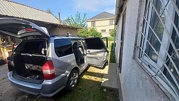 Mitsubishi Chariot: 1999 г., 2.4 л, Механика, Бензин, Минивэн — 4