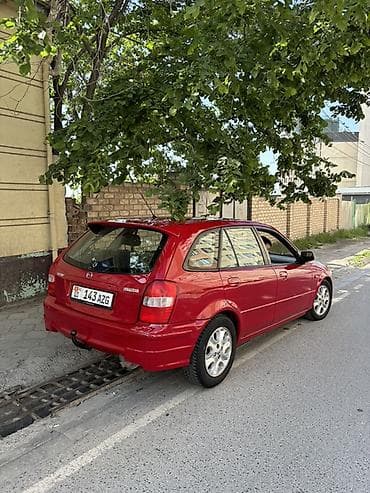 Mazda 323: 1998 г., 1.5 л, Механика, Бензин, Универсал