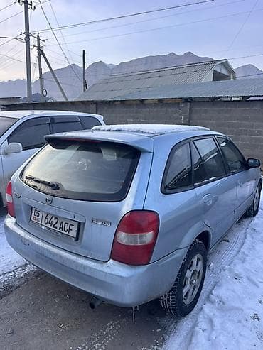 кузов 07: Mazda 323: 2001 г., 1.6 л, Механика, Бензин, Хэтчбэк — 2