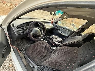 нива 1 7: Daewoo Lanos: 1997 г., 1.5 л, Механика, Бензин, Седан — 3