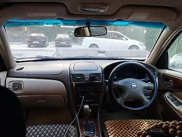 Nissan Sunny: 2004 г., Автомат, Бензин, Седан — 3