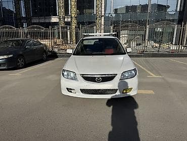 степ вагон спада 2003: Mazda Familia: 2002 г., 1.5 л, Автомат, Бензин, Универсал — 1