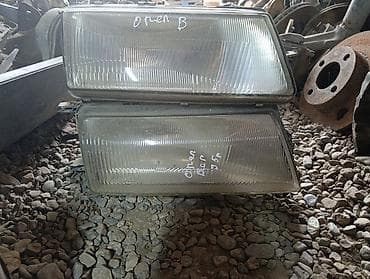 гольы 2: Комплект передних фар Opel — 1