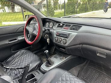 аудио усилитель: Mitsubishi Lancer: 2006 г., 1.6 л, Механика, Бензин, Седан — 9