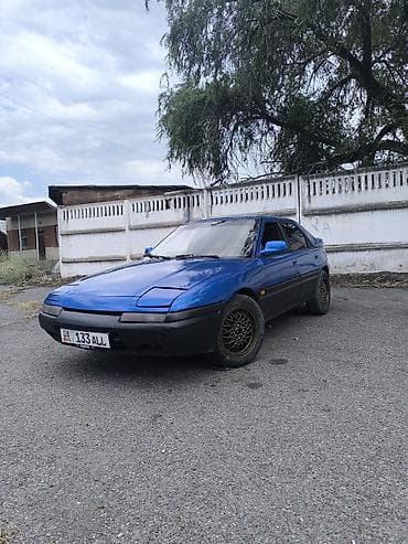 обмен на сапок: Mazda 323: 1994 г., 1.8 л, Механика, Бензин, Хэтчбэк — 1