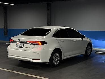 тайота из: Toyota Corolla: 2019 г., 1.8 л, Вариатор, Гибрид, Хэтчбэк — 6