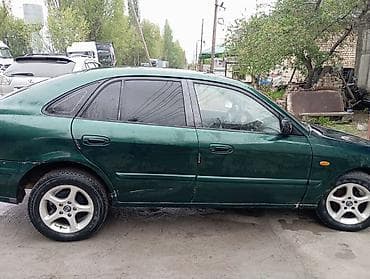 диски на форд фокус 1: Mazda 626: 1997 г., Седан — 1