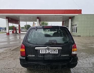 обмен транспорта: Mazda Tribute: 2001 г., 2 л, Механика, Газ, Внедорожник — 5