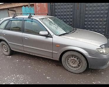 mazda: Mazda 323: 2002 г., 1.6 л, Механика, Бензин, Хэтчбэк — 4