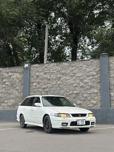 200000 автомат: Mazda Capella: 2000 г., Механика, Бензин, Универсал — 3
