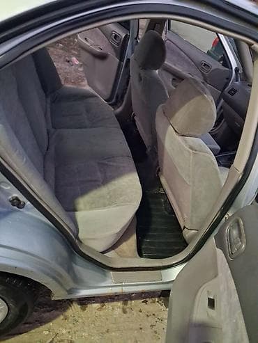 крыло на пассат б3: Nissan Sunny: 1999 г. — 6