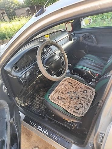 zimmer e9 pro: Mazda 626: 1997 г., 1.8 л, Механика, Бензин, Лифтбек — 5