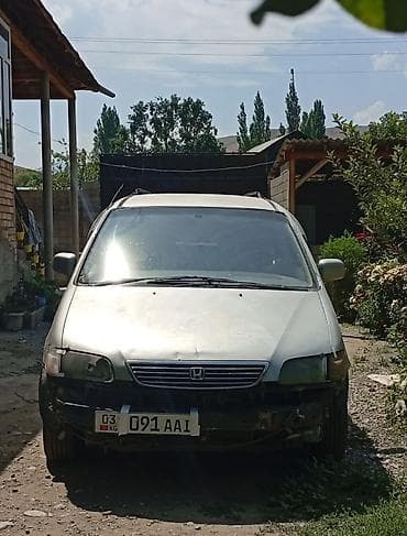 х5 е 53: Honda Odyssey: 1994 г., 2.3 л, Автомат, Бензин, Минивэн — 1