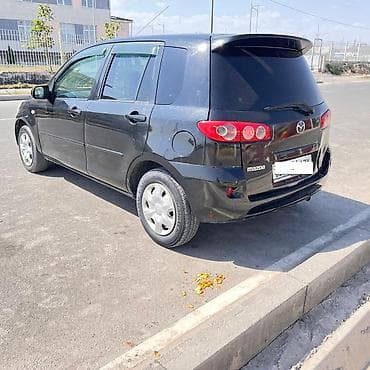 последующим: Mazda Demio: 2004 г., 1.5 л, Автомат, Бензин, Хэтчбэк — 7