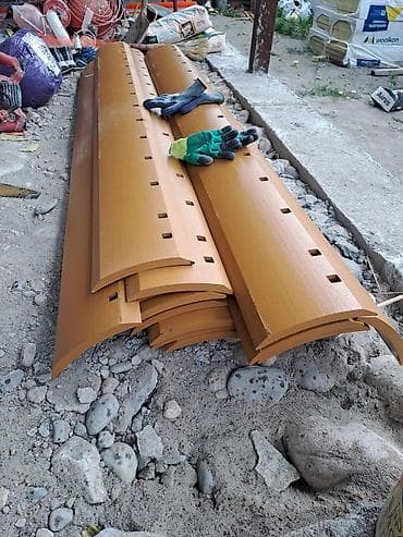 Үйдүн чатырынын кырына кооздолуп кагылган тактайлар: Грейдерный нож — 1