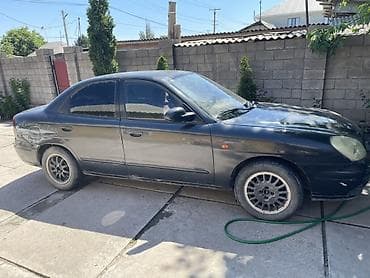 отдам в расрочку: Автомобиль седан, черный цвет, 4 двери. Киргизские номера. Механика — 3