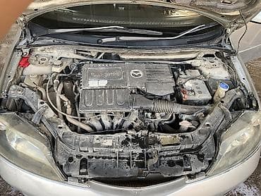 Транспорт: Mazda Demio: 2003 г., 1.3 л, Автомат, Бензин — 5