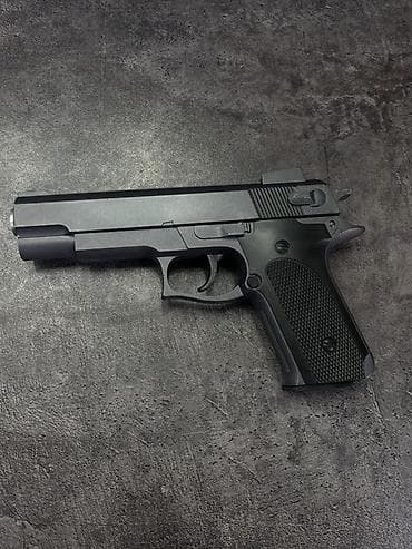 пистолет с пулями: Игрушечный пистолет-пистолет с магазинами - Материал: пластик (корпус — 3