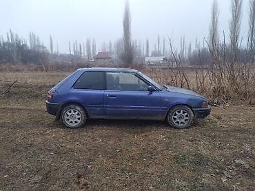 lada xray: Mazda 323: 1994 г., Хэтчбэк — 4