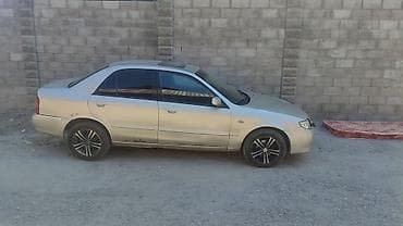 мазда катела: Mazda Familia: 2002 г., Механика, Бензин, Седан — 2