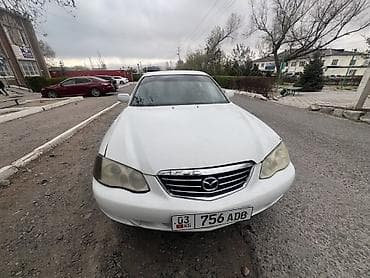 дорогие машины: Mazda Millenia: 1999 г., Седан — 10