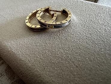 Серьги-кольца BVLGARI - Дизайн: классические кольца с фирменной