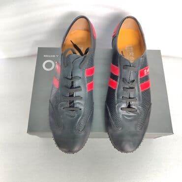 кожанные кеды: Кроссовки из натуральной кожи 
с перфорацией ( отверстия сбоку) — 8