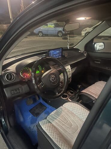 шины на эксковатор: Mazda 2: 2008 г., 1.4 л, Робот, Бензиновая, Хэтчбэк — 7