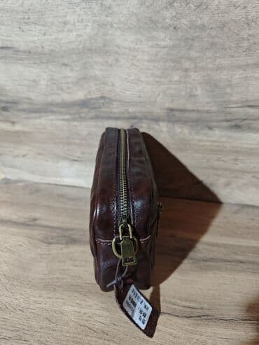 купить золотые серьги с жемчугом: Сумка клатч
Натуральная кожа — 2