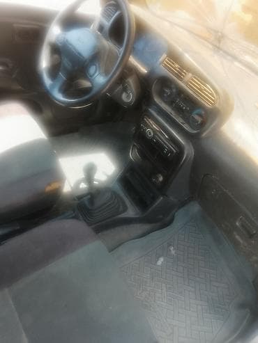 тетиктер: Daihatsu Cuore: 2002 г., 0.1 - engine capacity л, Кол менен иштөөчү, Бензин, Хетчбек — 1