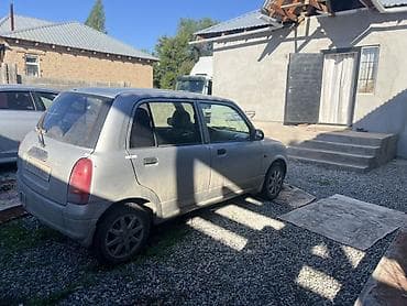 зеркало большие: Daihatsu Cuore: 2002 г., 1 л, Механика, Бензин, Хэтчбэк — 3