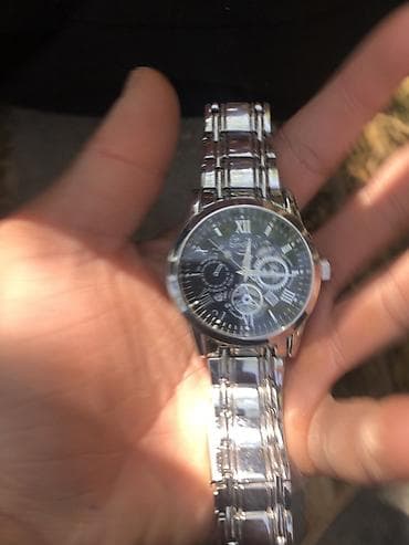 Мужские наручные часы с металлическим браслетом. - Корпус и браслет