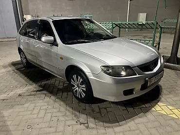 mazda 121: Mazda Familia: 2003 г., Автомат, Бензин, Хэтчбэк — 5