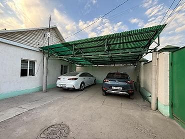 на дордое: Дом с двориком и навесом для авто - Кирпичный забор по периметру — 2