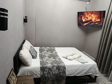 комната для двоих: Уютный номер с двуспальной кроватью и собственным санузлом — 1