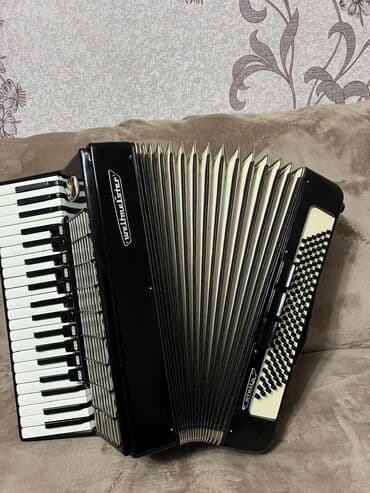 Аккордеон клавишно-кнопочный (пьяно-аккордеон) черного цвета at lalafo.kg Аккордеон клавишно-кнопочный (пьяно-аккордеон) черного цвета