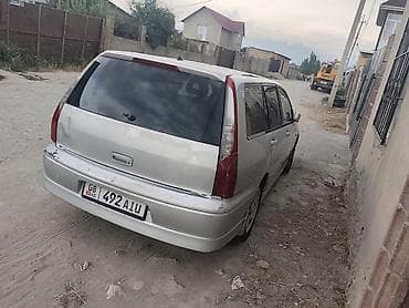 chek it: Mitsubishi Lancer: 2001 г., 2 л, Автомат, Бензин, Универсал — 3