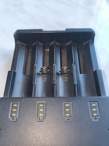 кандер: 1. Умное зарядное устройство LiitoKala Lii-CH4 Новая. Цена 1500 с — 3