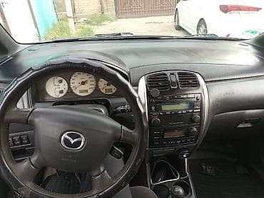 mazda 325: Mazda PREMACY: 2002 г., 1.8 л, Механика, Бензин, Минивэн — 8