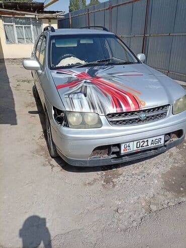 передний бампер нексия 2: Nissan Wingroad: 1998 г., 2 л, Автомат, Универсал — 1