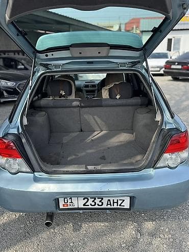 токмок кун чыгыш: Subaru Impreza: 2003 г., 1.5 л, Автомат, Бензин, Универсал — 5